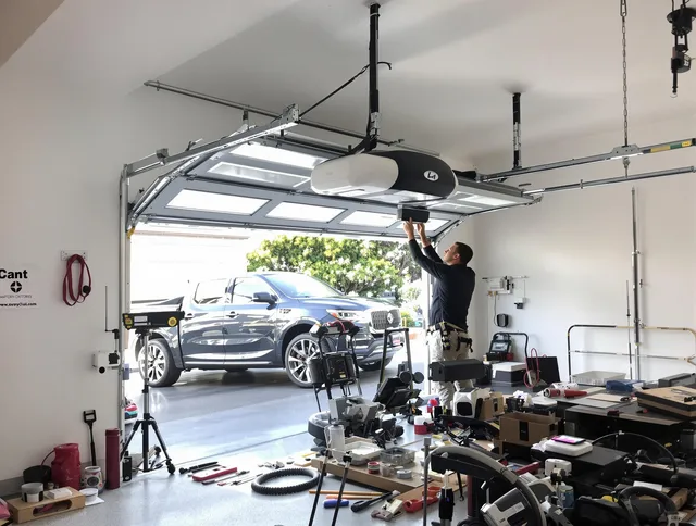 Brecksville Garage Door Repair specialist installing smart garage door opener system in Brecksville home
