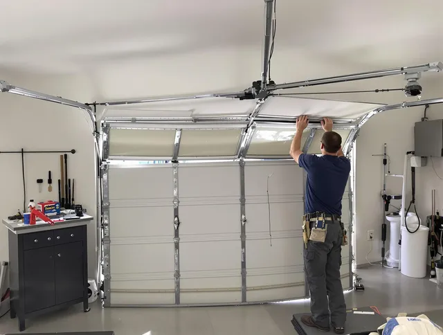 Brecksville Garage Door Repair specialist performing precise section replacement on Brecksville garage door