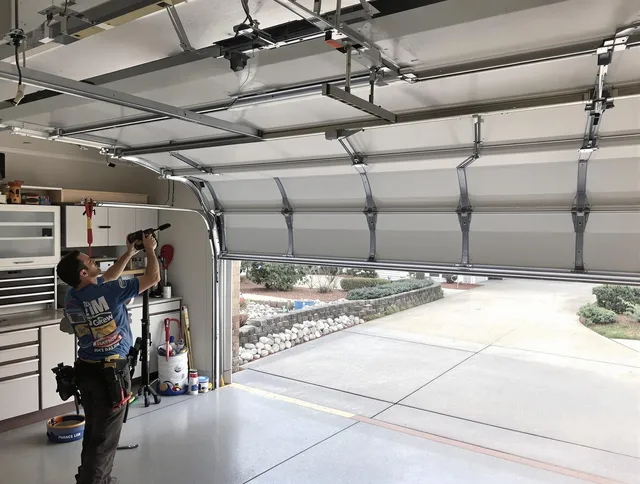 Garage door track repair service by Brecksville Garage Door Repair in Brecksville
